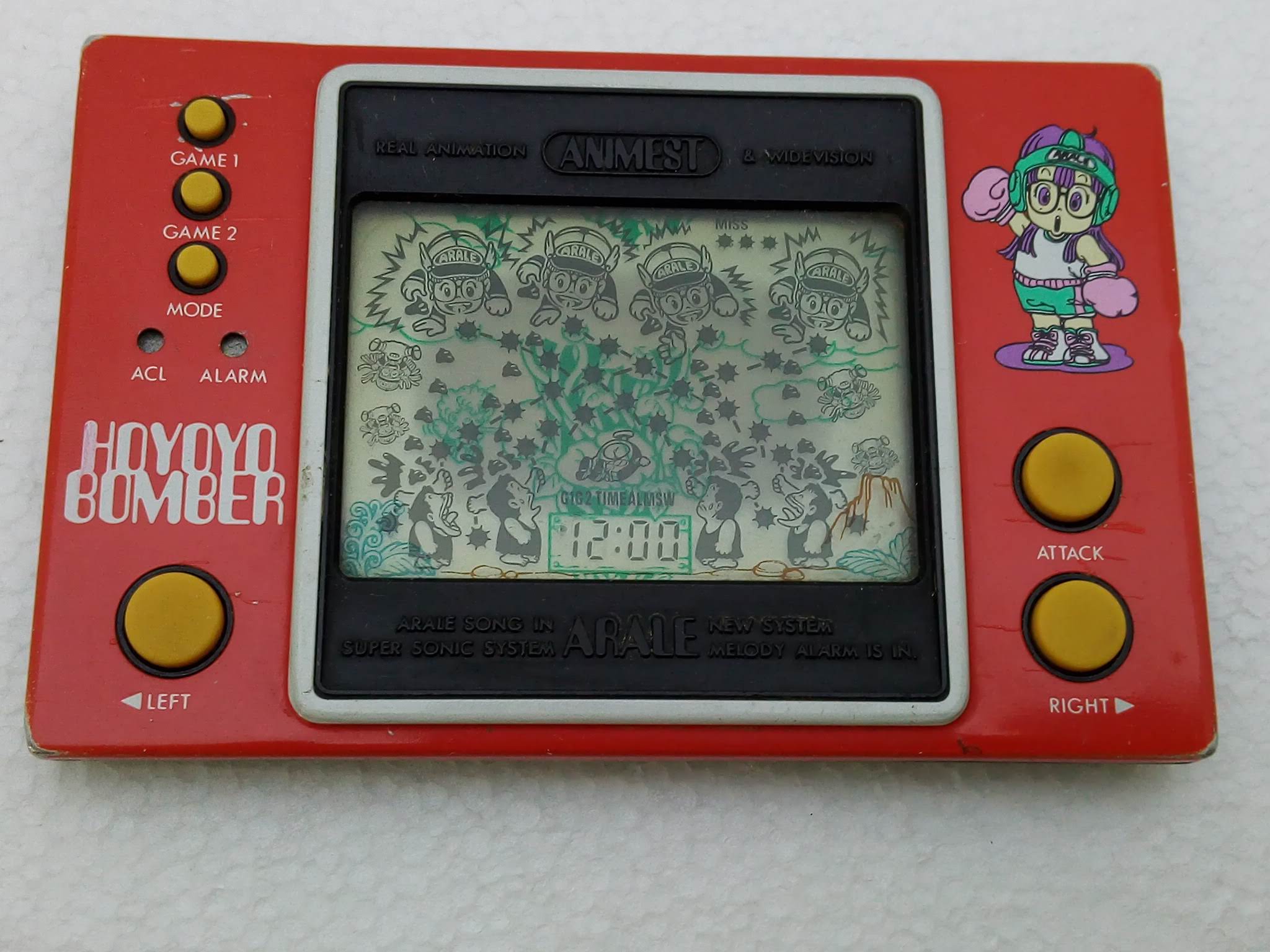 Handheld Empire - game | Popy Electronics : Dr. Slump Arale Part I Hoyoyo  Bomber - red